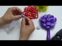 Como elaborar flores con pétalos quemados para tiaras de bebé, video 542